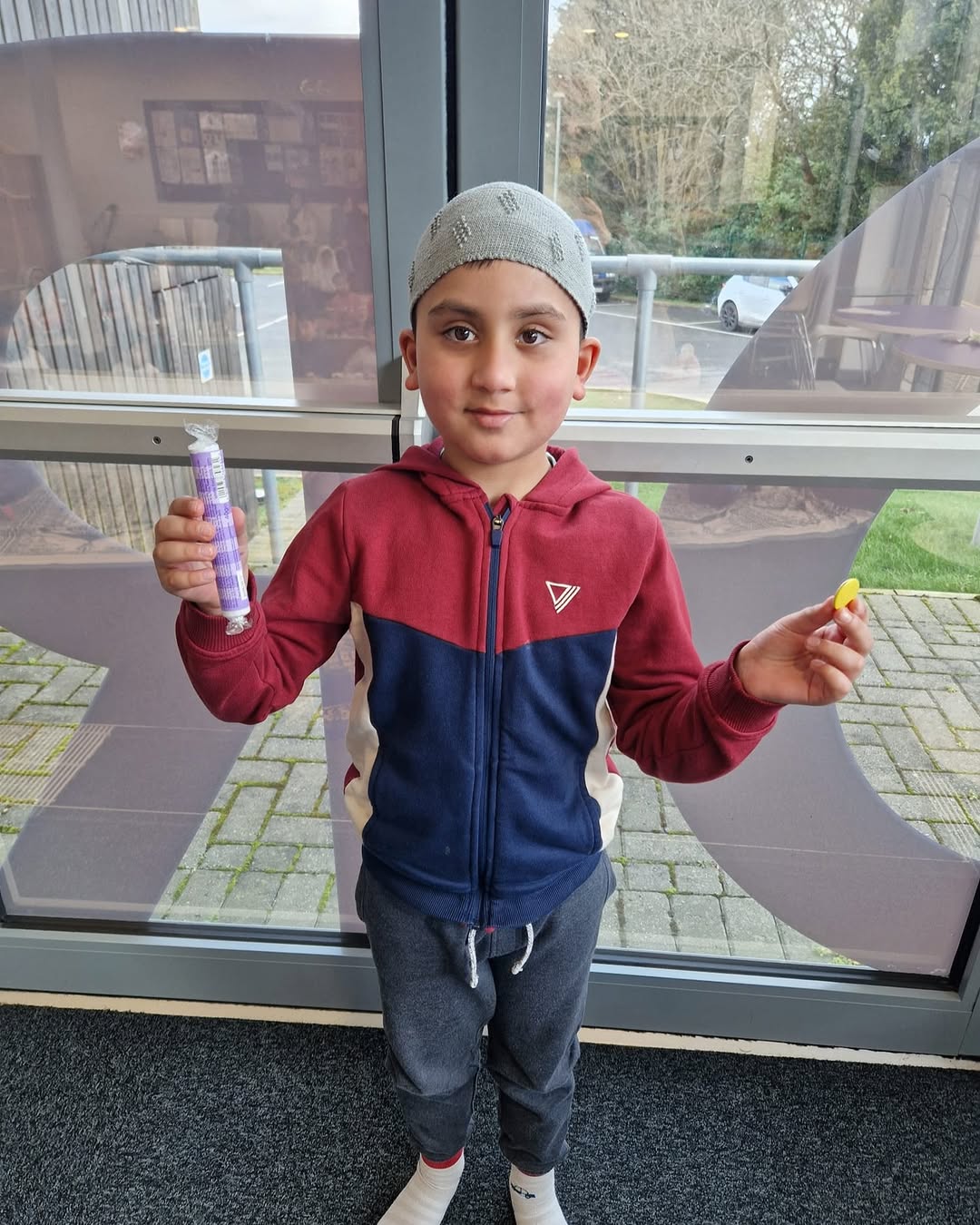 Ayaan celebrating: Yellow badge